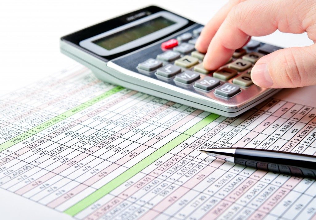 person computing financial statement