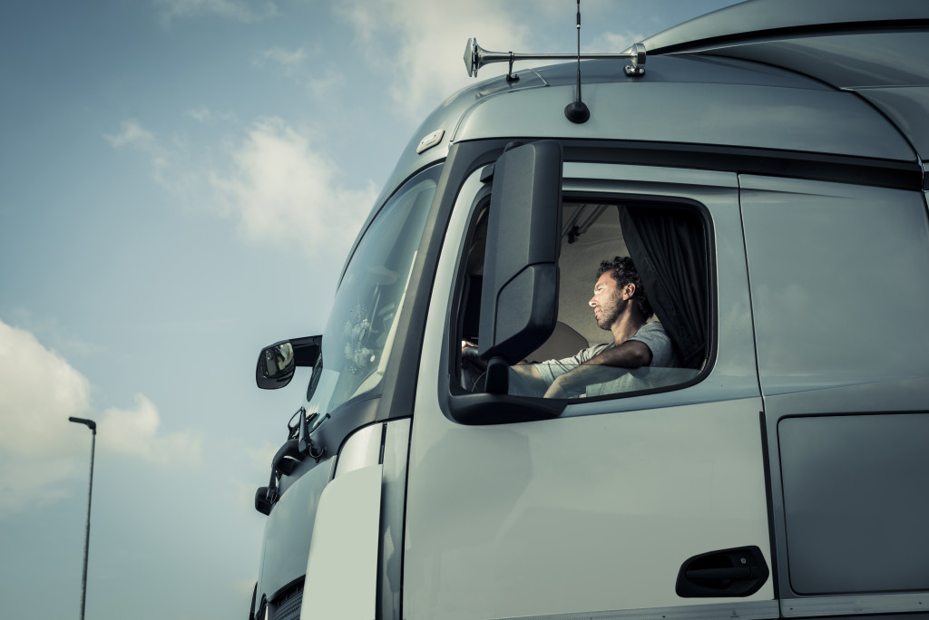Man driving a truck
